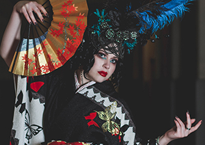 Young woman in red, black and white kimono